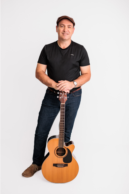 Bennie, guitar specialist at The Amateur Musician